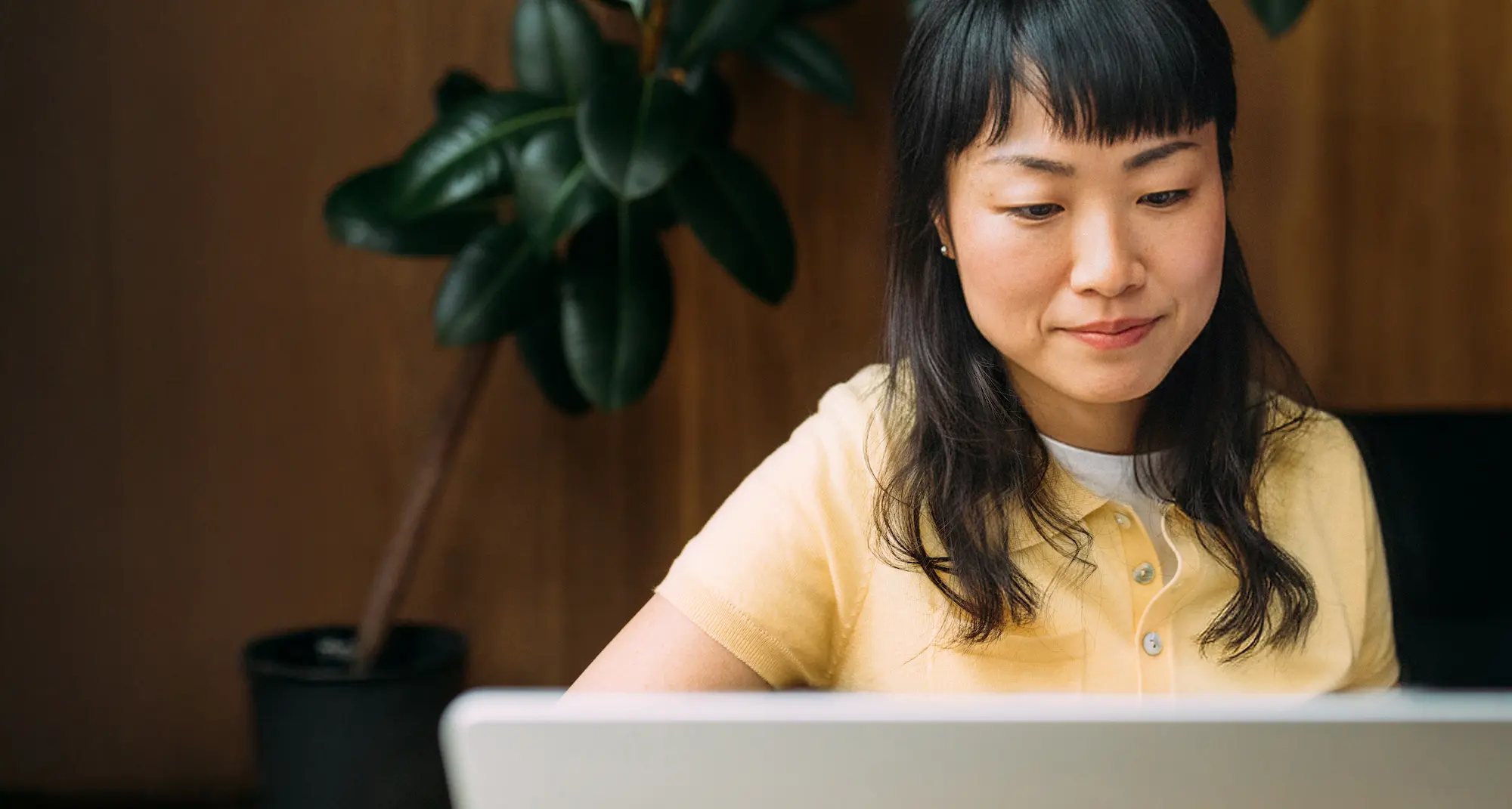 Woman working at a computer